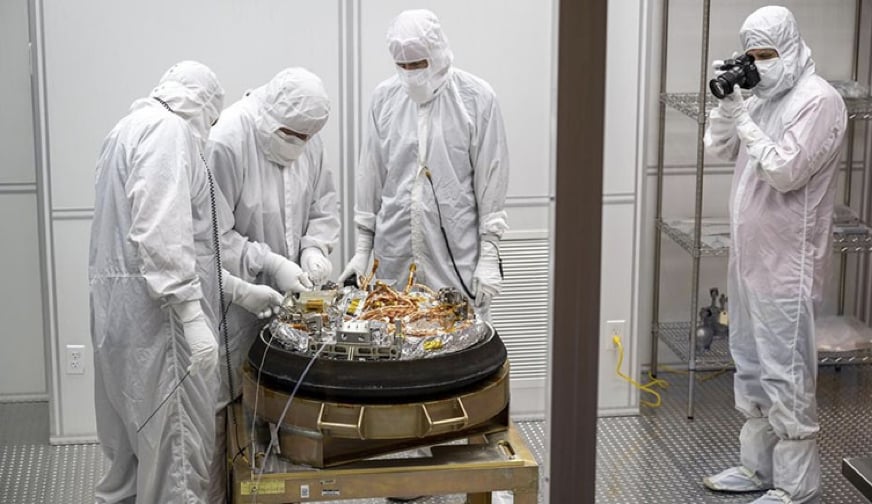 Scientists look at equipment for inspecting returned Mars samples
